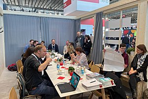 Community-Treffen auf der Euroshop 2023